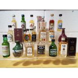 Eighteen miniature/taster bottles of malt and blended Scotch whiskies including 18 year old Isle of