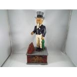 A cast iron money bank in the form of Uncle Sam.