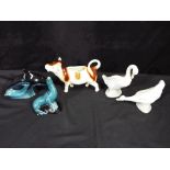 A lot to include two Nao geese figurines, Poole pottery dolphin,