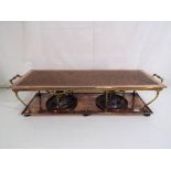 A vintage copper warming tray with twin burners approximately 16 cm x 68 cm x 23 cm, Est £30 - £50.