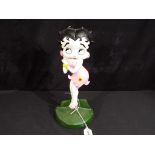 A cast iron door stop in the form of Betty Boop approx 36cm (h) Est £15 - £30