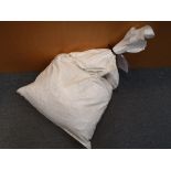 A sealed sack of unsorted costume jewellery, approx weight in excess of 27kg,