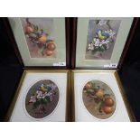 Four small limited edition prints depicting birds and fruit, all mounted and framed under glass,