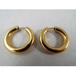 A pair of 18ct gold sleeper earrings, stamped 750 approx weight 6.