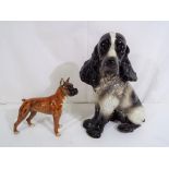 Goebel - two Goebel dog figurines to include large model of a spaniel,