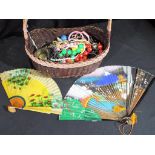 A basket containing a very large quantity of costume jewellery to include torque bracelet, bangles,