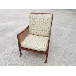A mahogany framed rattan chair - condition: appears to be in very good condition with no major
