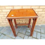 A mahogany nest of two tables