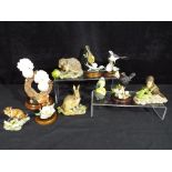 Ten animal and bird figurines to include Border Fine Arts, Country Artists and similar.