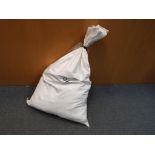 A sealed sack of unsorted costume jewellery, approx weight in excess of 25kg,