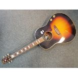 A 'Vintage' electro acoustic guitar model # VE660-TSB