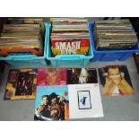 A large quantity of 33 rpm vinyl records to include Duran Duran, Rod Stewart, ABBA, Tina Turner,
