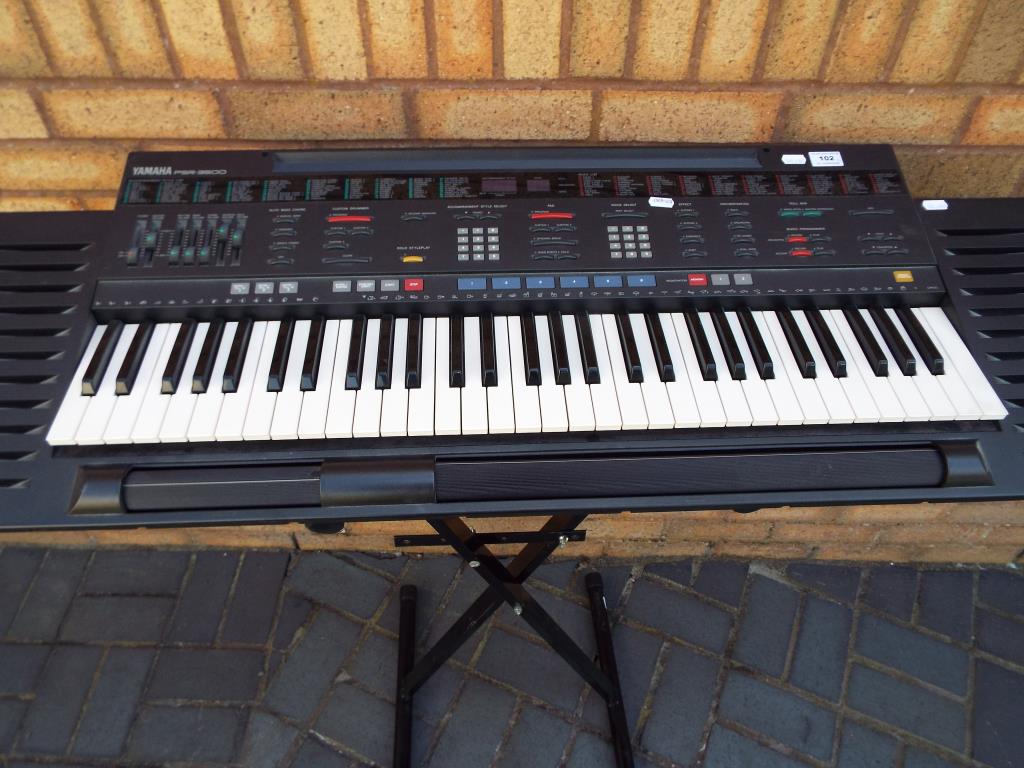 Yamaha PCR-3500 electronic keyboard with stand and a box of sheet music [3]. - Image 2 of 2