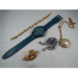 A Swatch automatic wristwatch and a small quantity of costume jewellery.