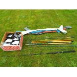 A collection of fishing equipment to include four rods comprising a Silstar GT Fly,
