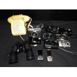 Photography - a quantity of photographic equipment comprising cameras to include Helena, Olympus,