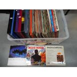 A large quantity of 33 RPM vinyl records to include Simon and Garfunkel, The Four Tops,