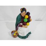 Royal Doulton - a Royal Doulton figurine, entitled The Old Balloon Seller #HN1315,