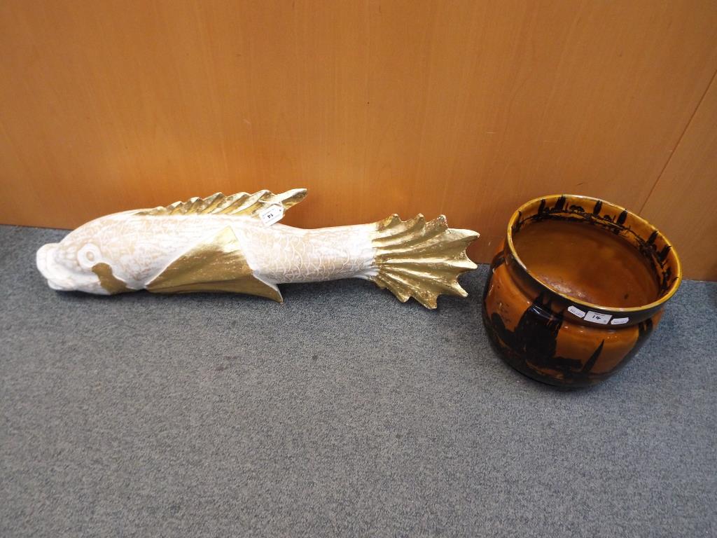 An unusual carved wooden fish with gilded highlights,