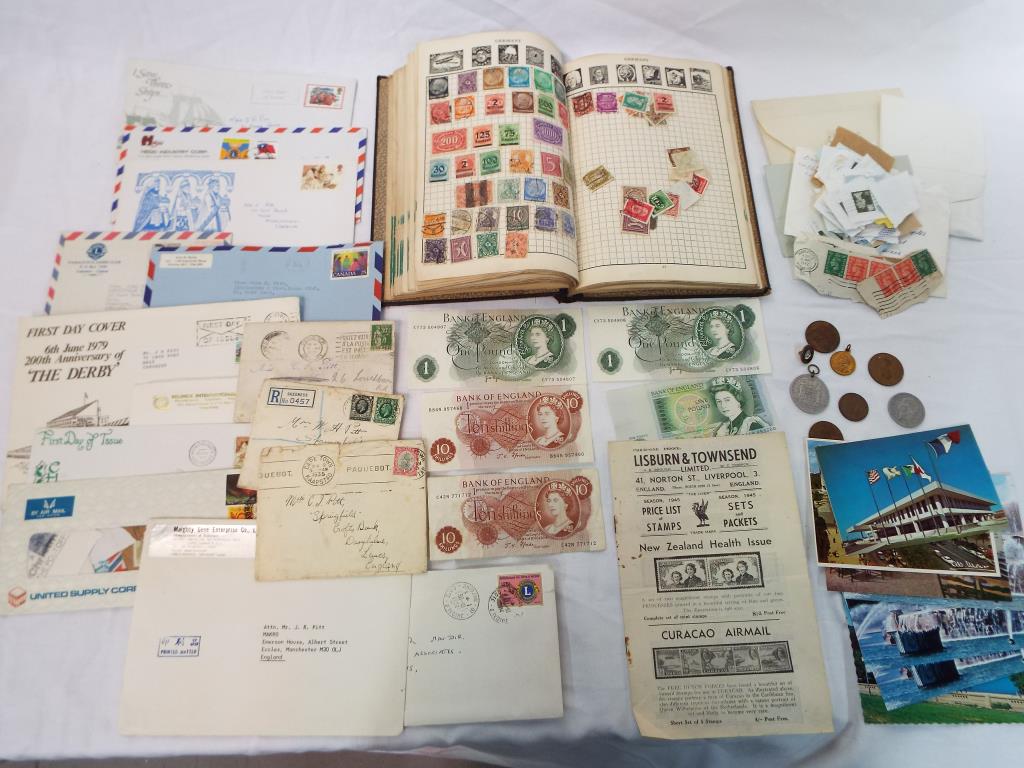 A lot to include a The Wanderer stamp album containing a quantity of UK and Foreign stamps,