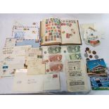 A lot to include a The Wanderer stamp album containing a quantity of UK and Foreign stamps,