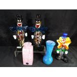 A matched pair of Murano style glass clowns approximate height 27 cm and a further Murano style