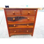 A chest of two over three drawers,