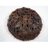 A large Oriental tortoiseshell brooch,