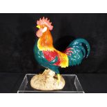 A Beswick Leghorn cockerel figurine, approximate height 25 cm.