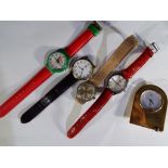 A collection of wristwatches to include Timex, Joy, Royale and a miniature clock.