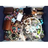 A large quantity of unsorted costume jewellery