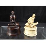 A pair of small erotic figurines approx 7 cm (h).