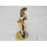 Royal Worcester - A Royal Worcester figurine entitled Strephon depicting a boy playing a pipe,