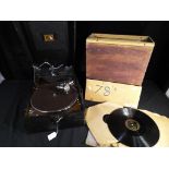 A His Masters Voice portable gramophone and a quantity of 70 RPM records [2], Est £50 - £80.