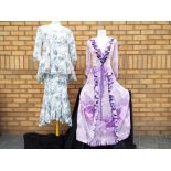 Vintager Clothing - a peasant style vintage full length dress decorated with a purple velvet ribbon