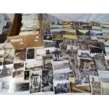In excess of 700 early - mid period UK topographical and subject postcards.