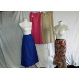 Vintage Clothing - a full length skirt with leg split, a fish tailed heavily patterned skirt,