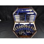 A large good quality wooden canteen of cutlery with blue interior circa 1960s comprising six dinner