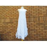 Vintage Clothing - a good quality cotton lined broderie anglaise dress with frilled detailing to