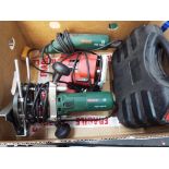 A quantity of power tools, including Bosch POF 500A router, a Powerdevil router,