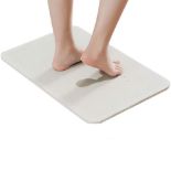 Unused Retail Stock - a ceramic bath mat made from a natural product called Diatomite,