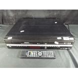Toshiba RD-XV47 VHS to DVD recorder with original remote, Est £20 - £40.
