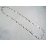 A gentleman's silver neck chain.