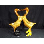 A pair of wooden 'Lovers' ducks.