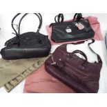 Radley Handbags - three good quality fashion Radley handbags in original dust covers comprising a