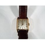 Omega - a lady's Omega wristwatch with brown leather branded strap, Omega marked to face,