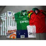 Three replica football shirts, including Wales, Ireland,