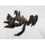 A bronze crab.