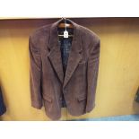 A gentleman's wide cord brown jacket, fully lined with Paisley, size 40R,