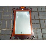 A good quality wood framed bevel edged wall mirror with inlaid decoration,